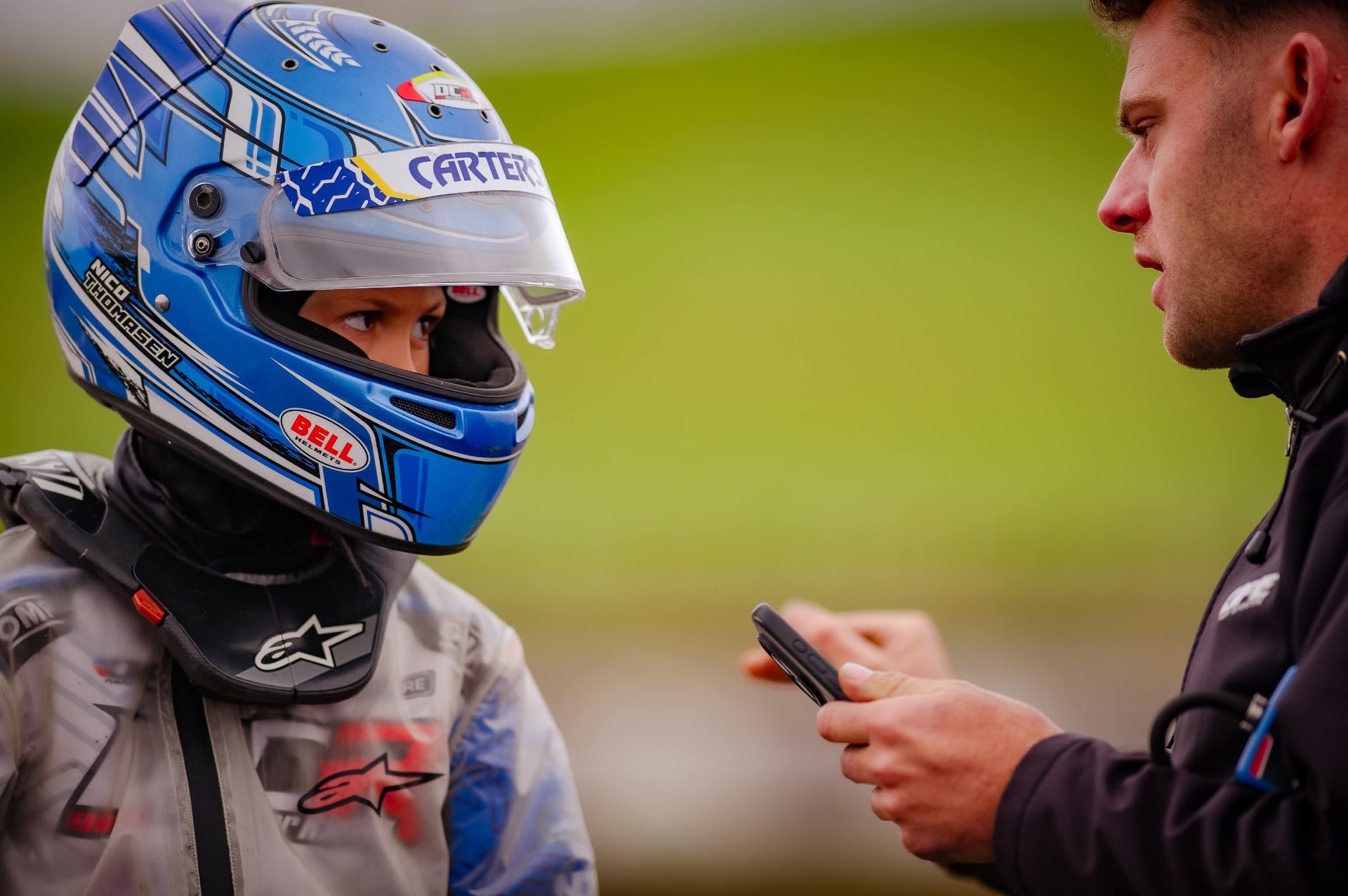 Nico Thomasen in his Bell helmet debriefing with his engineer